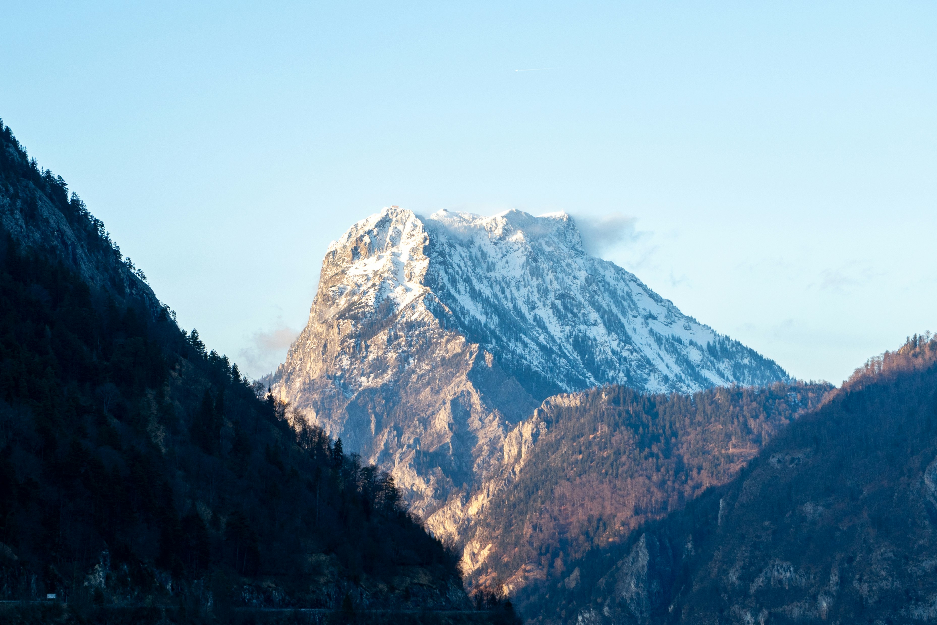 snow covered mountain during daytime